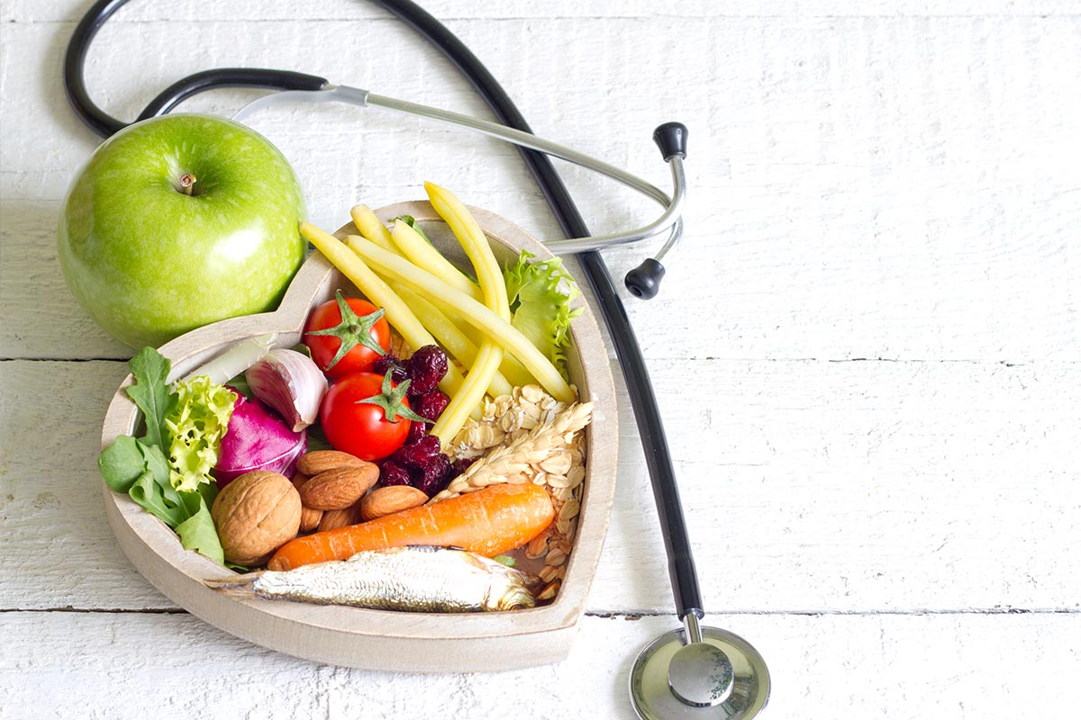 Healthy foods by a stethoscope