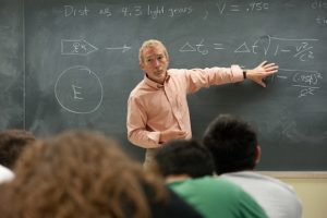  Professor teaching students the dynamics of physics. 