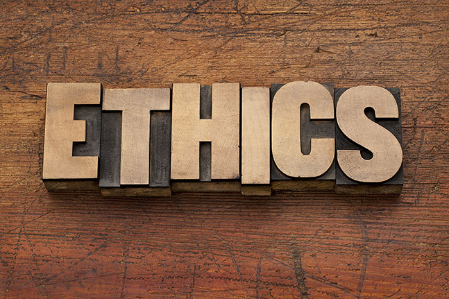 The word "Ethics" shown in wood blocks