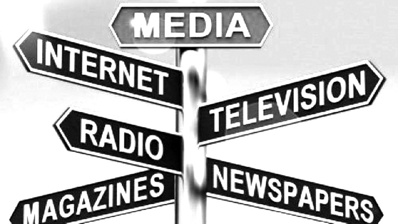 A street sign depicting forms of media