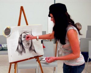 Picture of a student drawing a portrait