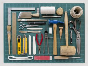 The tools needed for bookbinding