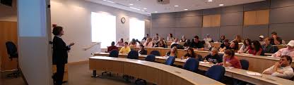 This image is of a large communications seminar for students.
