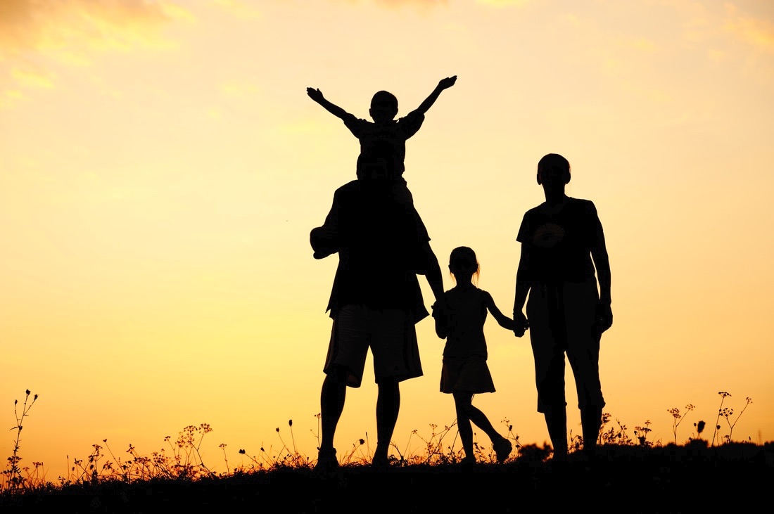 This image shows a happy family--one that may be studied in this course.