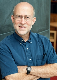 This image is of Professor Melvin smiling at the camera.