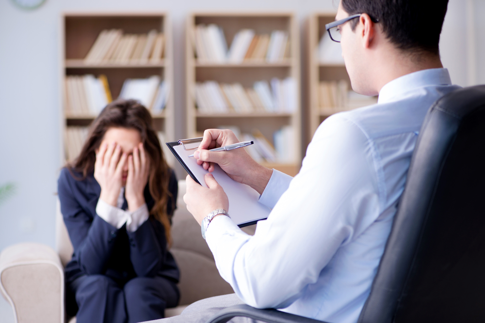 A male counselor with a female client