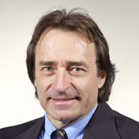 This image of Professor Bain shows him looking excitedly at the camera.