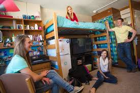 Everyone hanging out in the dorm room