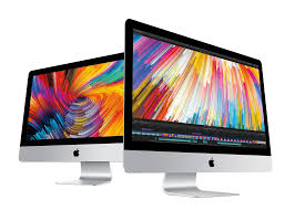 Two Apple desktop computers