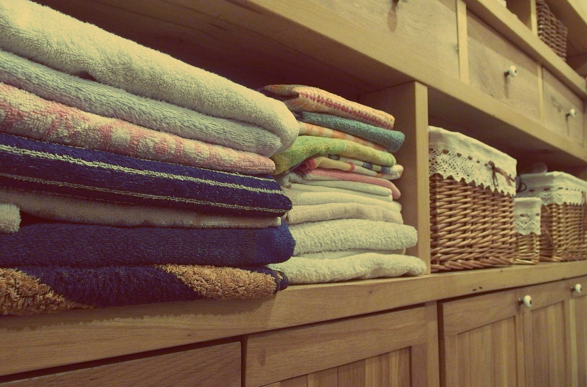 Folded towels on a shelf