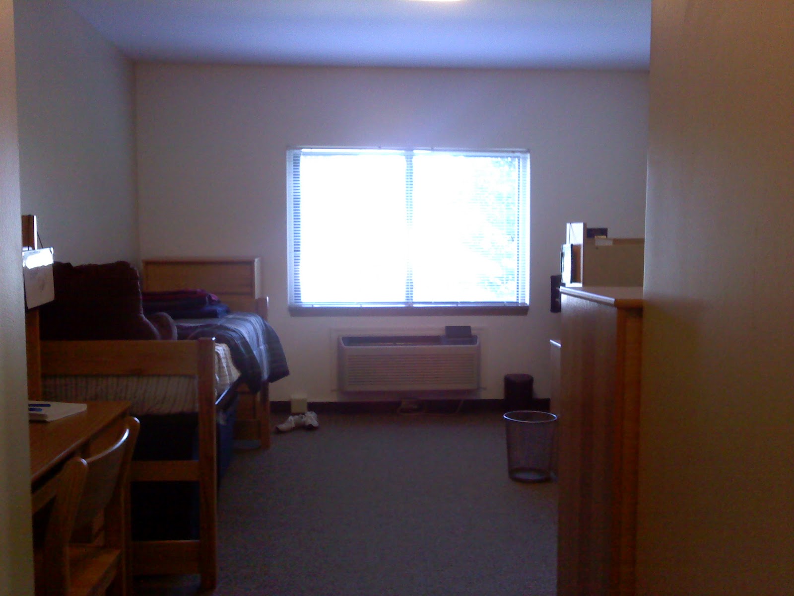 south hall furnished dorm room with bedding