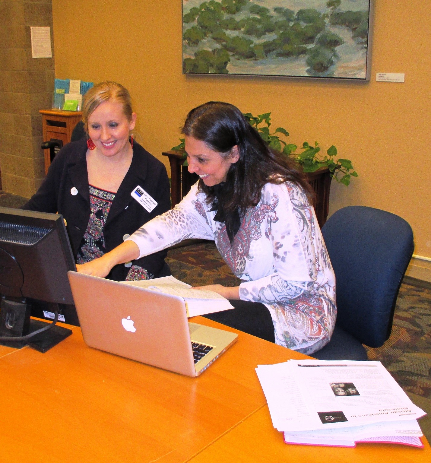 Two librarians doing mail work – Bethel Library