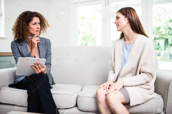 Two girls talking with each other