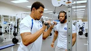 A scholar serving as a gym instructor