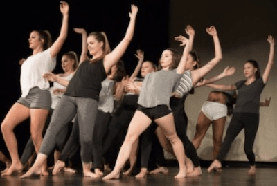The Dance Team rehearses a contemporary group number for the Dance Showcase.