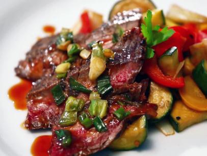 grilled flank steak with fried vegetables