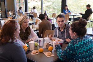 Students enjoying their meals at the Quad Cafe