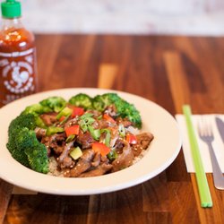 photo of steak broccoli and rice