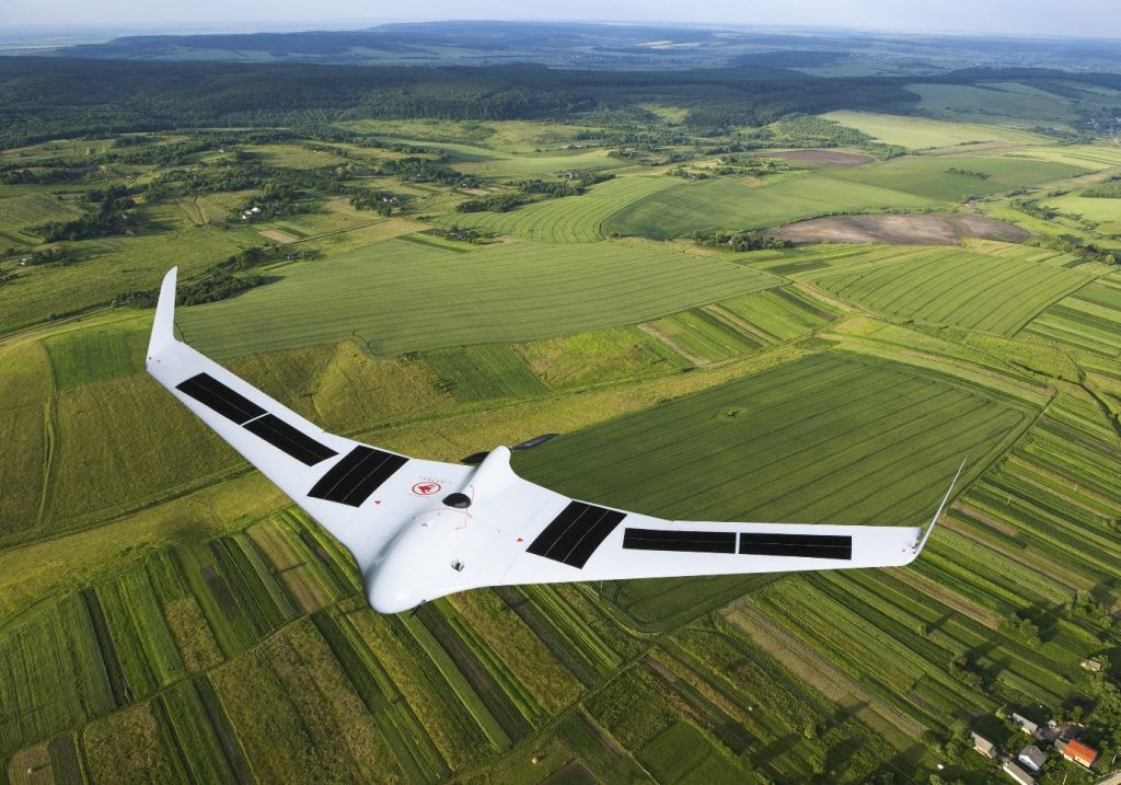 Unmanned Aerial Vehicle flying over fields