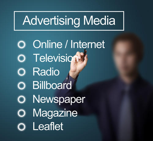 A man listing available advertising media