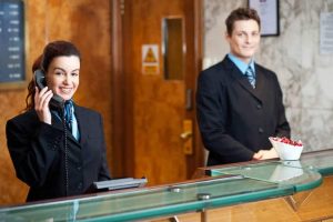 A photo of an hotel intern and a co-worker