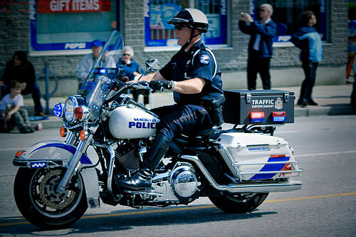 Policeman riding his bike