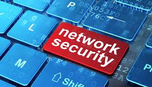The picture shows a computer keyboard with network security as one of the keys
