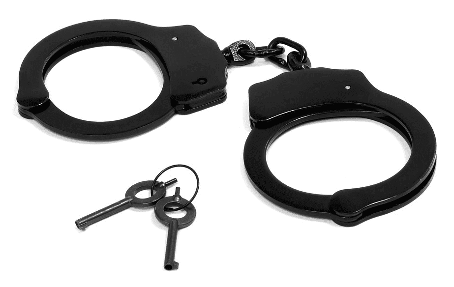 handcuffs beside two keys