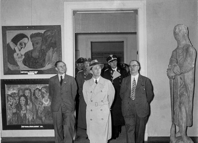 Nazi Party officials review the "Degenerate Art" exhibit in 1937.
