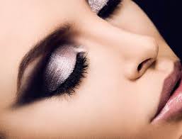 An image of a woman's face with makeup