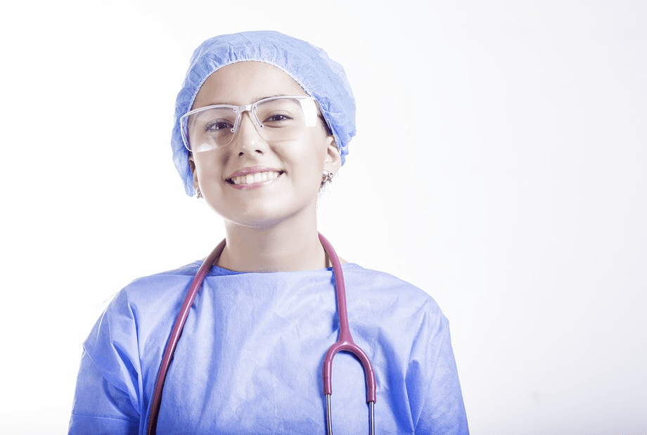 a nurse wearing a lab gown and a stethoscope