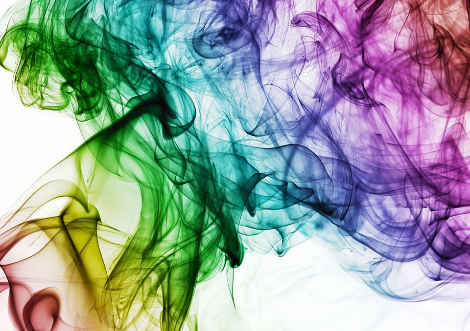 A combination of different colors forming a smoke-like image