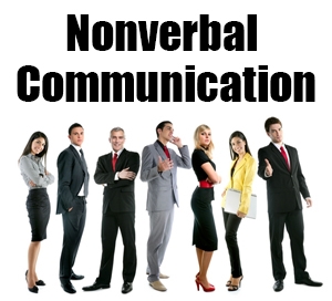 People in office wear with the words nonverbal communication written above them