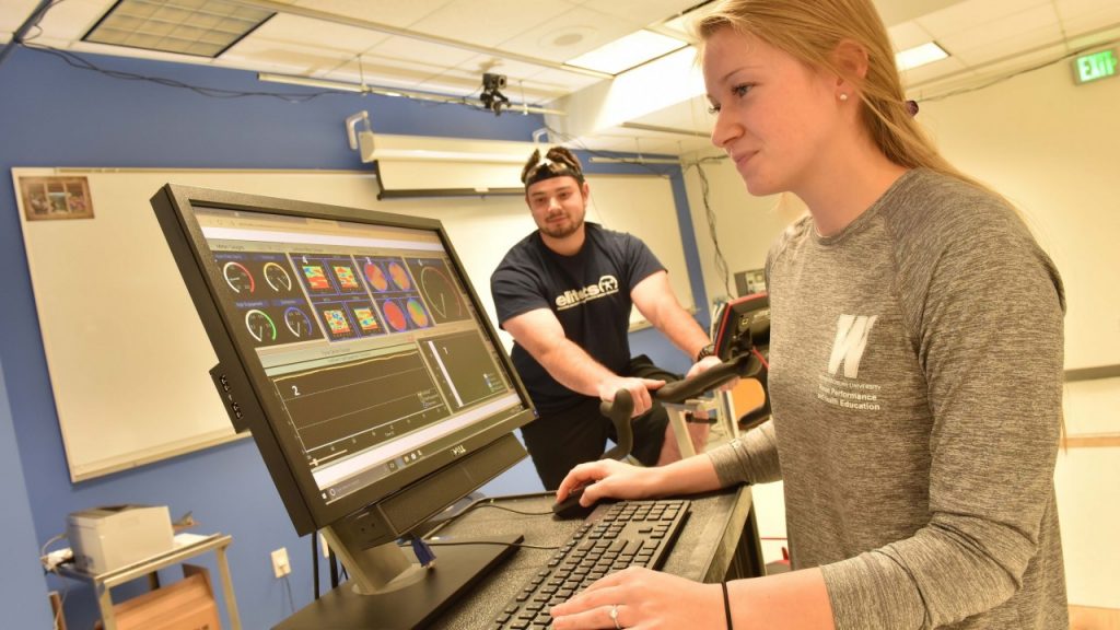 Students using computer in class