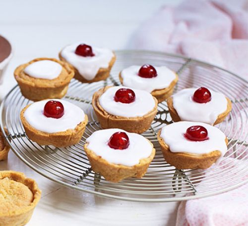 Baked cookies placed on a metal stand
