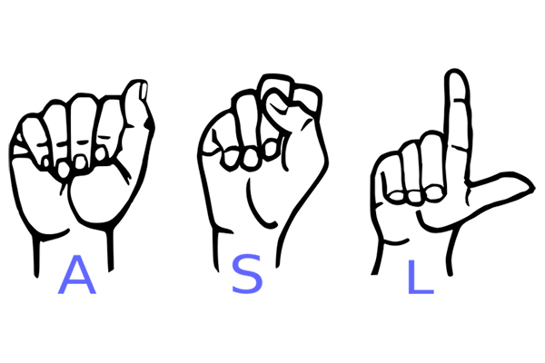 Human hands making hand signs for ASL