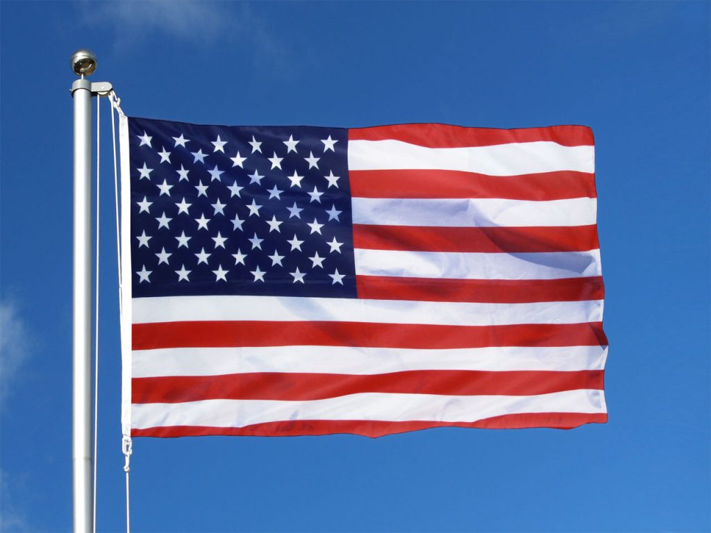 american flag blowing in the wind