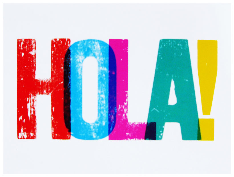 A word HOLA written in colorful letters