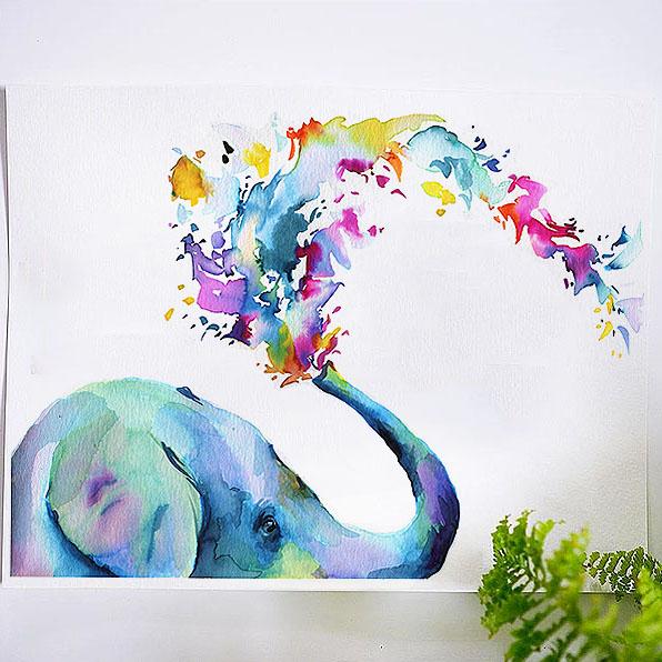 A watercolor painting of an elephant with colourful water coming out of trunk