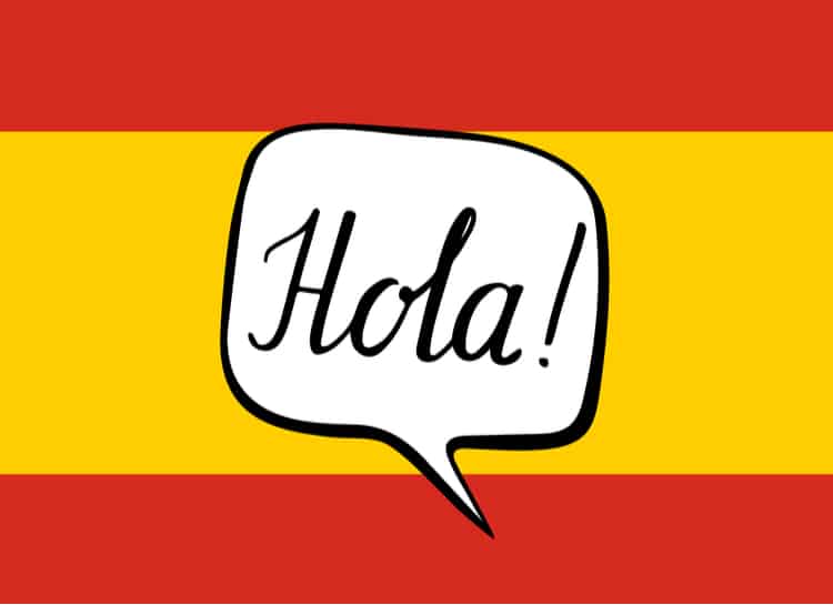 The Spanish flag with a word bubble written "Hola!"