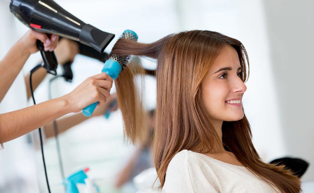 young female student at the hair salon