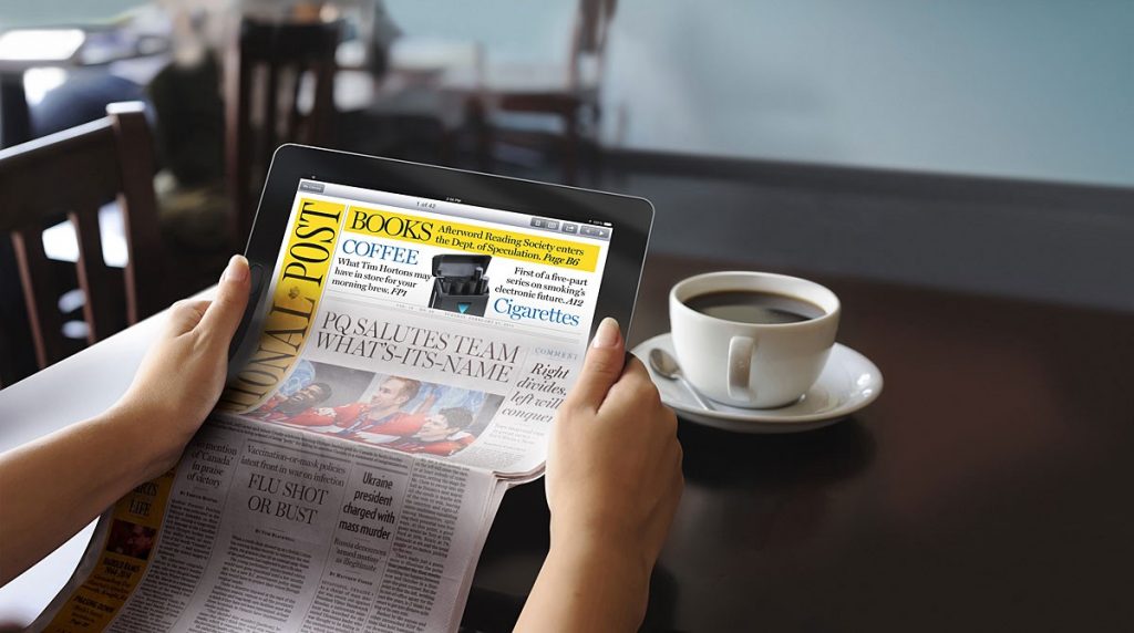 female student holding an ipad that gradually turns into a physical paper newspaper