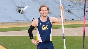 a track student with a bar