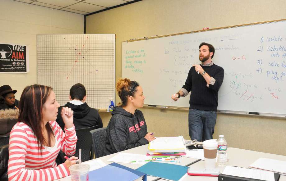 Professor teaching students in class.