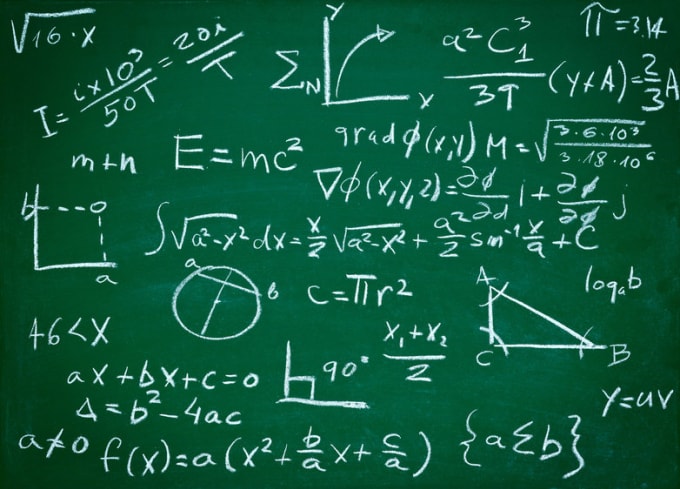 Image of equations taught on the board. 
