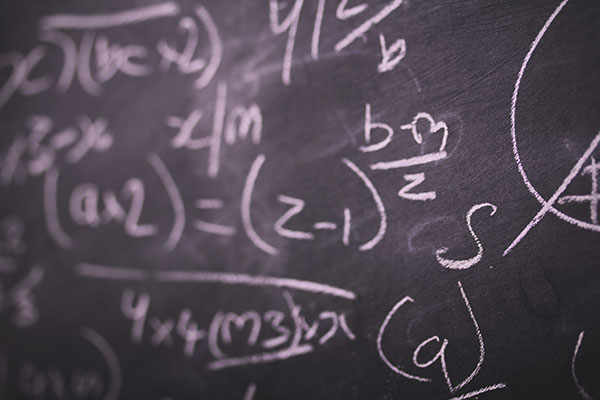 Equations solved on the board.