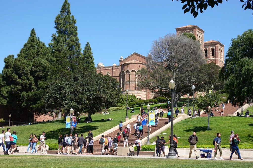 Image of students passing on campus. 