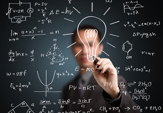 a person drawing lightbulbs, physics, math and chemistry icons on the blackboard