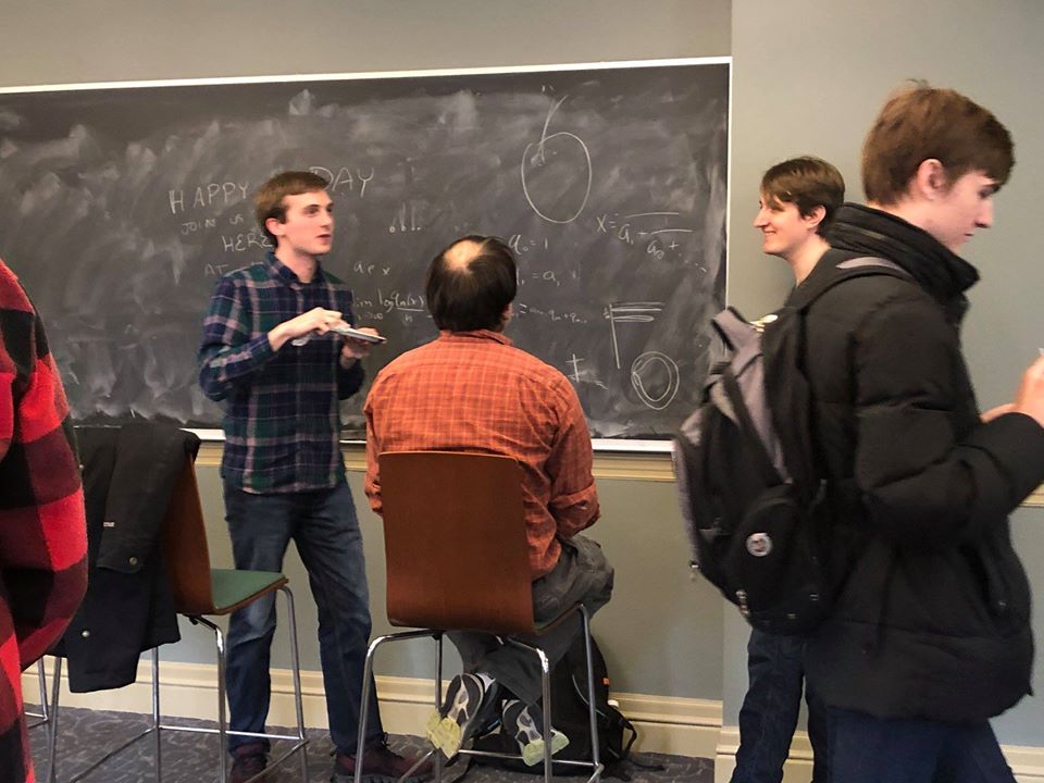 A group of students in a math class at Brown