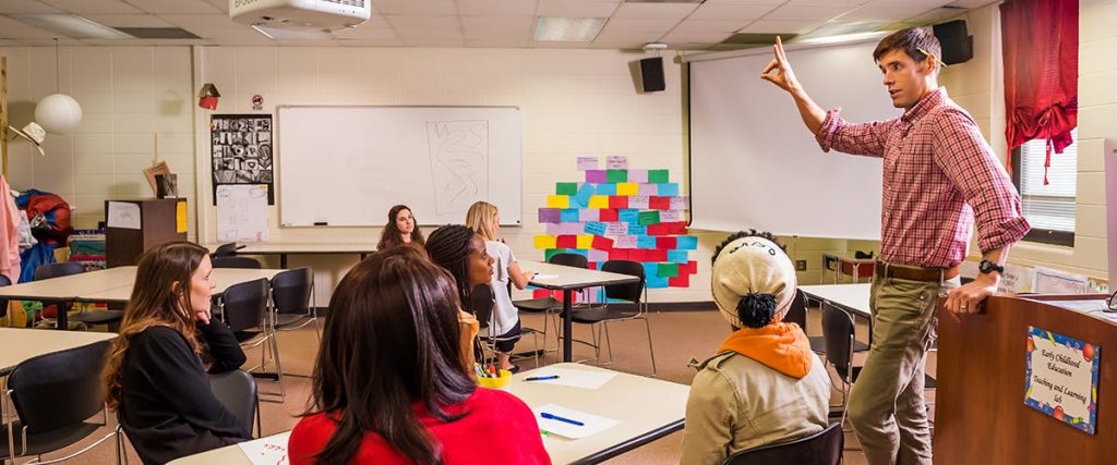 Professor teaching students in class.